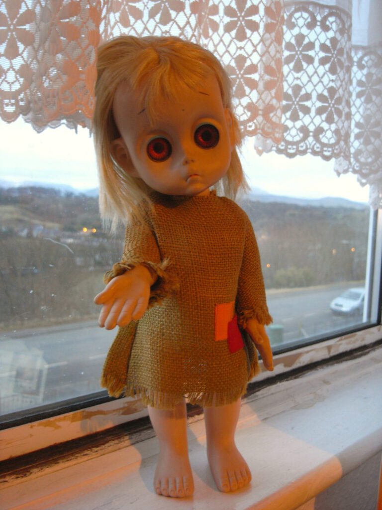 Little Miss No Name doll with her hand out photo